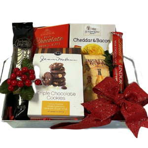 Seasonal Tin gift hamper with chocolate caramels, cheese spread, chocolate sticks, chocolate chip cookies & more